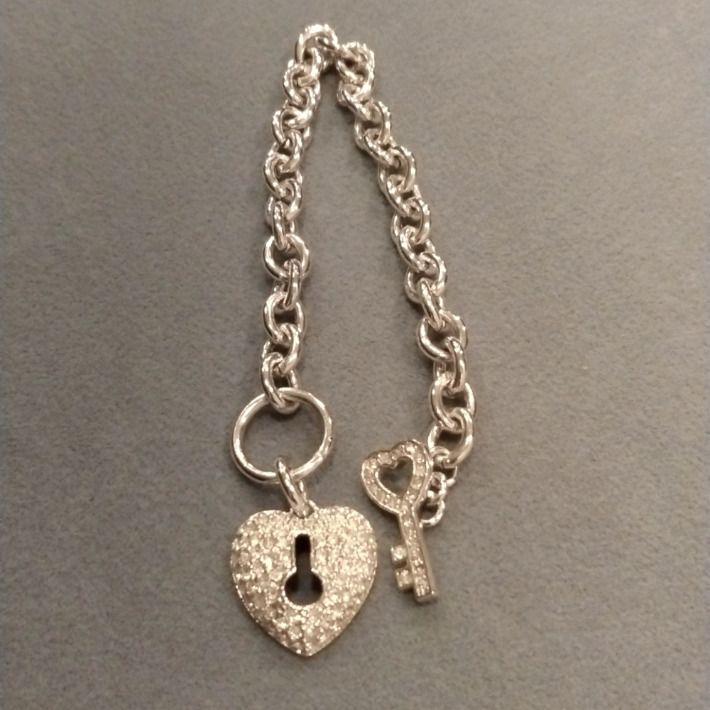 Vintage pave heart locket sparkling bracelet. High polished rhodium plated piece